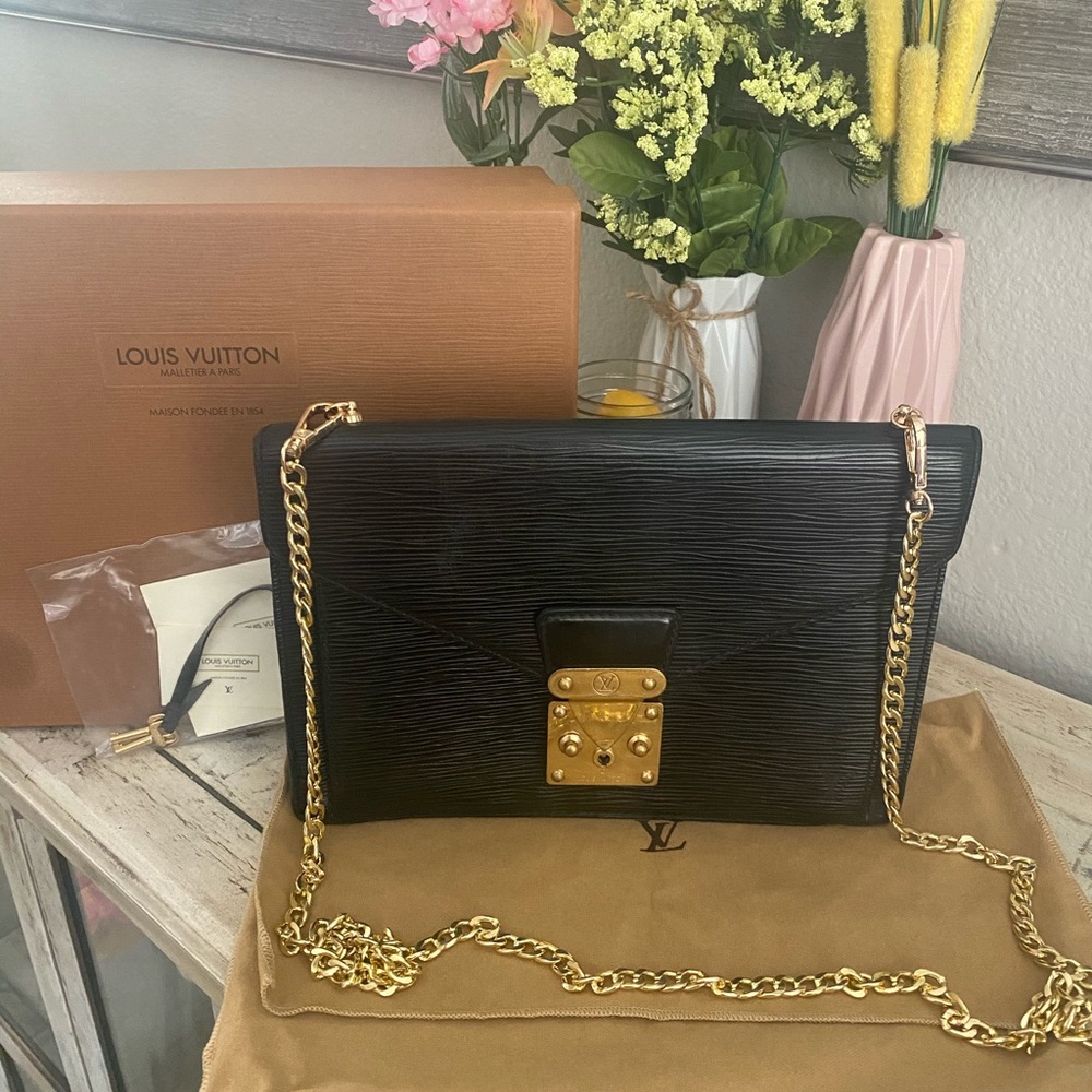 SOLD LOUIS VUITTON Serie Dragonne